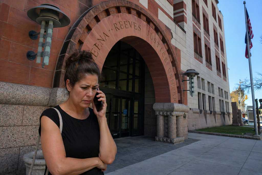 Woman in front of justice center