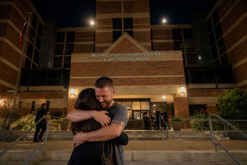 Emotional embrace at Bexar County Jail