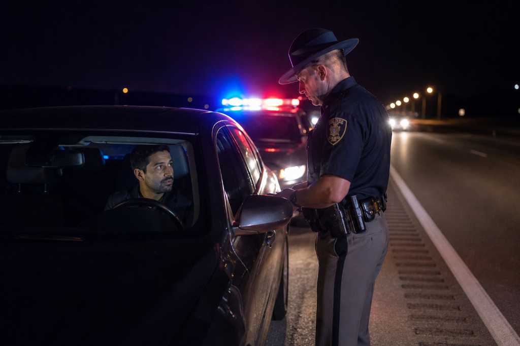 Nighttime police stop on highway