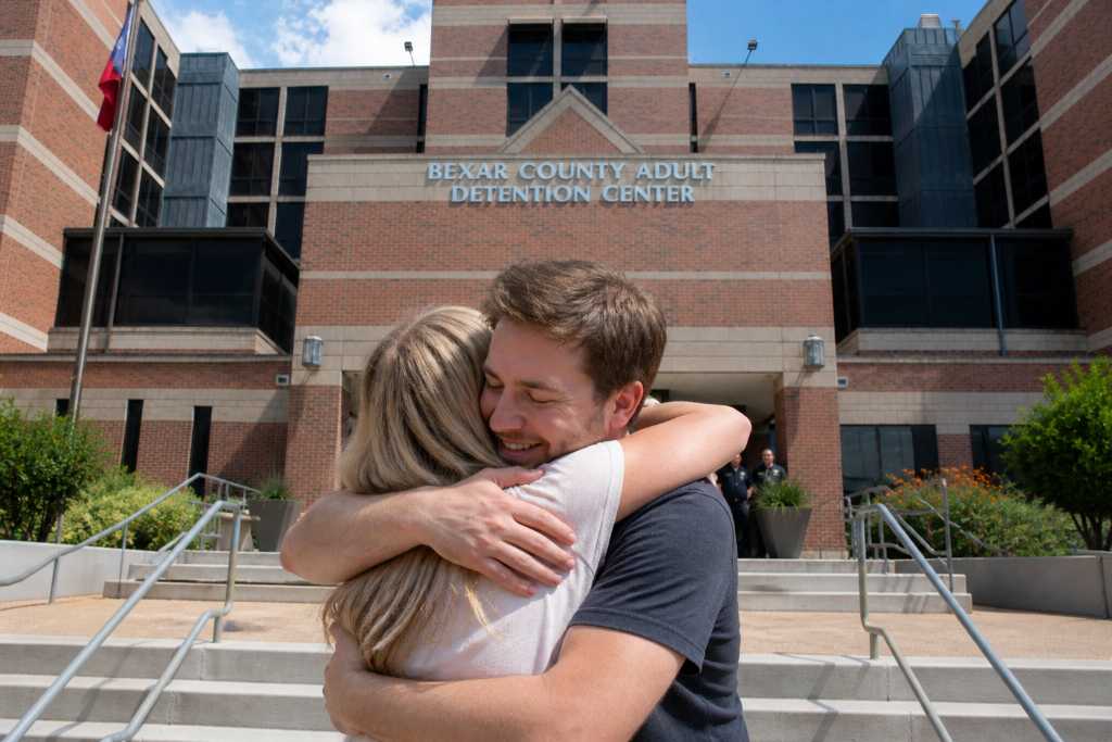 Reunion at the detention center entrance