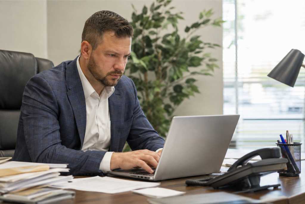 Busy Bail Bondsman Organizing Digital Files